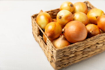 Onion on the kitchen table. onion slice. onion rings. Fresh Yellow Onion. Natural, fresh, vegetarian food. Agricultural products. Healthy eating. Vegetables. Farmer's market. Space for text.Copy space
