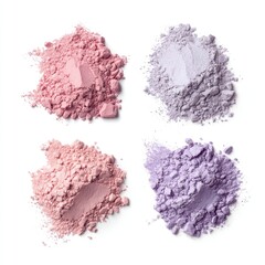 Four piles of loose powder makeup in shades of pink and lavender