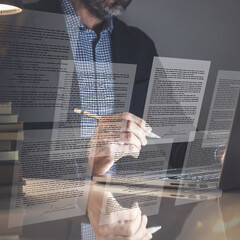 Man hand writing electronic signature on laptop virtual screen. Sign contract, business agreement.