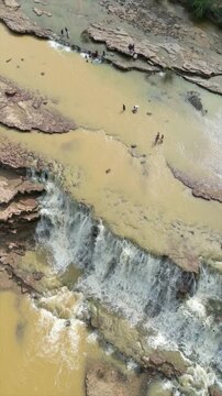 4K Drone shot of Beautiful waterfall. Kutch. Gujarat. India. Monsoon waterfall in kutch hills. Nature landscape. Travel background.
