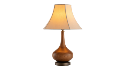 Elegant wooden table lamp casts warm inviting glow for cozy home ambiance