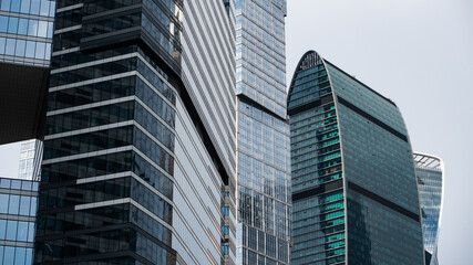 Fototapeta premium walls and windows of high business building bottom view