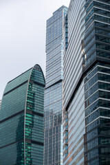 Obraz premium walls and windows of high business building bottom view