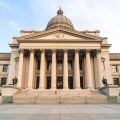 Obraz premium Wide shot of a state capitol building, light beige facade, columns, dome, steps, and plaza