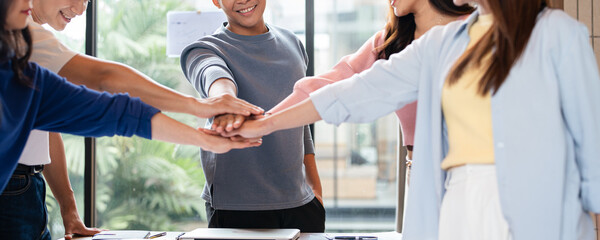 business people with hand stack in office for trust, synergy or positive reinforcement. Teamwork,...