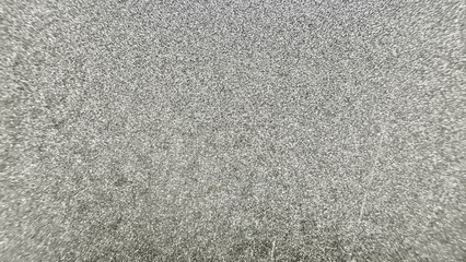 silver metallic textured surface with fine granular details ideal for abstract digital design...