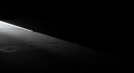 Low-Key Slate Texture with a Single Grazing Light for a Minimalist and Intense Backdrop