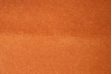 Soft orange felt texture background for design and creative use