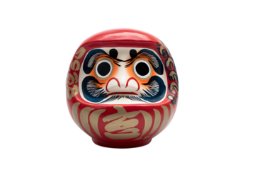 Daruma doll displaying resilience and determination isolated on white background