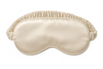 Beige sleep mask resting on transparent background