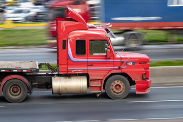 Red truck cab with stripes