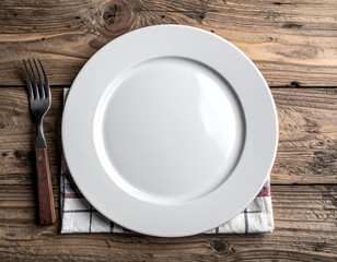 White ceramic dinner plate on rustic wooden table
