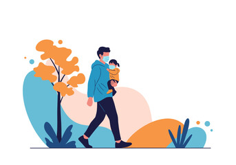 A father wearing a mask carries his child through a park in the autumn season with colorful trees and foliage