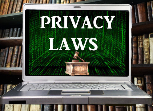 laptop with a words privacy laws