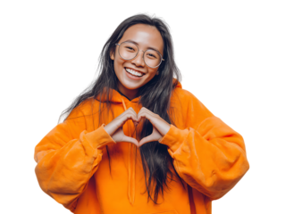 Happy girl showing love and care with hand gesture. Kindness, charity concept.