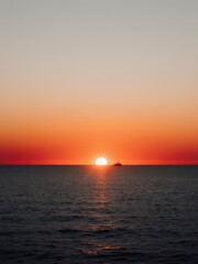 Sunset reflection over the ocean coastal location nature photography tranquil environment aesthetic viewpoint