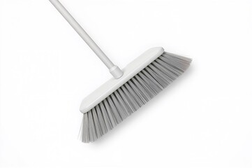 Isolated cleaning broom against a white backdrop