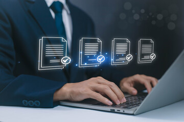 Businessman typing on laptop with digital document icons, symbolizing online data management,...