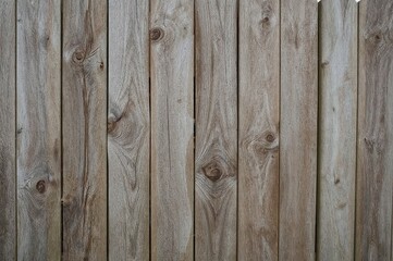 Naklejka premium Section of an aged wooden fence without paint