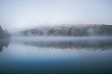 Fototapeta premium Foggy Autumn Morning on the Lake