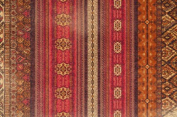 Ethnic Aztec design. Seamless tribal motif. Folk textile pattern. Ikat-inspired background. Traditional stripe decoration.