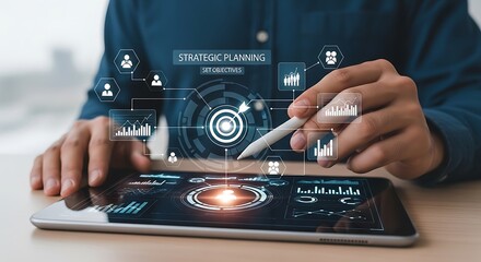 Businessman Using Tablet with Strategic Planning Interface for Business Goals and Objectives