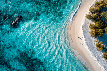 Stunning aerial view of turquoise waters, white sand beach, and lush green shoreline