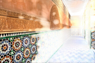 Intricate islamic geometric tile patterns and arabic calligraphy adorn the walls of a sunlit...