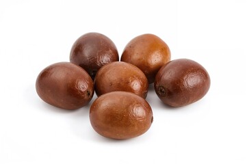 Fototapeta premium Chestnuts separated on a plain white backdrop, showcasing natural autumn fruits with healthy skin