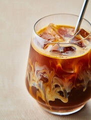 Iced Coffee with Cream and Metal Straw