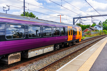 Electrified suburban passenger rural commuter railway line England UK