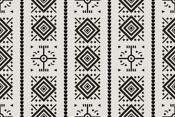 Obraz premium Aztec Navajo pattern. Vector Aztec Navajo geometric shape seamless pattern background. The geometric southwest pattern is used for fabric, textile, home decoration elements, upholstery, and wrapping.