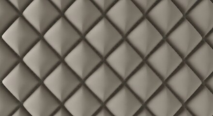 Close-up of a quilted, diamond-patterned, beige fabric surface.