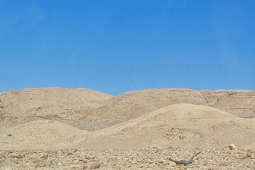 Arava desert sand dunes and blue sky