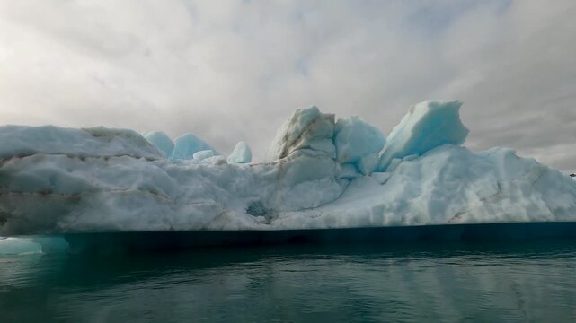 Arctic Icebergs in Greenland in the arctic sea video 4k - Svalbard Norwegian archipelago - Climate change