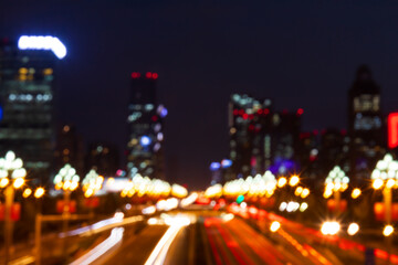 The night view of Century City on Tianfu Avenue in Chengdu in a blurry lens