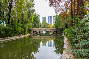 Naklejka premium The Swan Lake Stone Bridge landscape in Century City, Chengdu, Sichuan Province