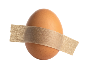 A brown egg with a beige adhesive bandage wrapped around its center.