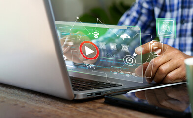 Digital Education and Online Learning Concept. Person using laptop with virtual of e-learning,...