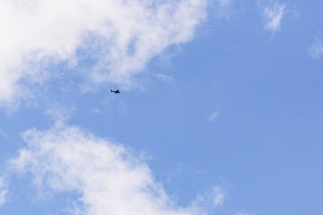 blue sky and clouds with airplane