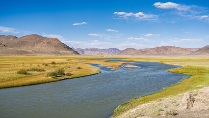 Summer mountain landscape view of Murghab river in high altitude valley along Pamir Highway,...