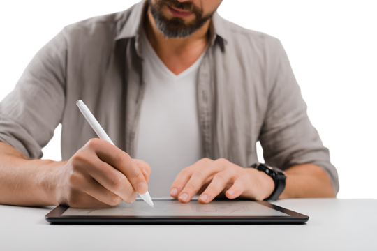 Man using a stylus on a tablet.
