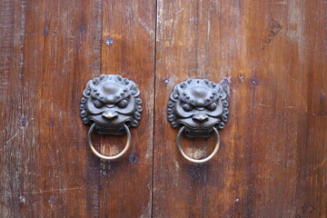 The door cymbal pull ring on the main gate