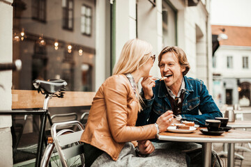 Mature couple sitting in a cafe having a coffee