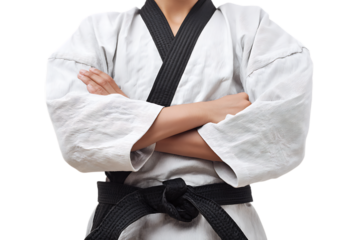 Martial arts expert with black belt, arms crossed.