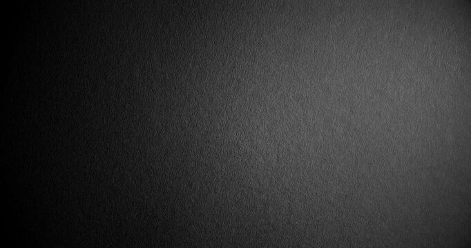 Rotating Cinematic Dark Textured Backdrop. Smoothly spinning dark textured surface with a cinematic feel, perfect for overlay effects in video projects.

