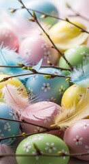Pastel easter eggs with feathers and pussy willow branches for easter decoration