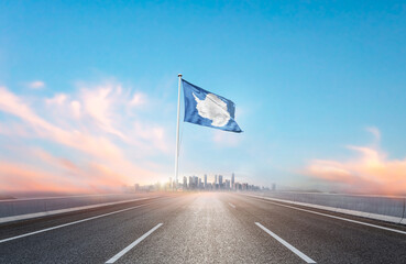 Antarctica national flag with mast waving with beautiful skyline. A view from highway. Antarctica...