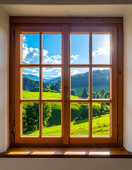 Scenic green valley view with open wooden window under sunlight creating peaceful countryside landscape.