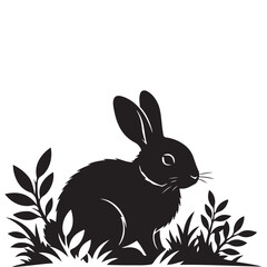 Black Silhouette of a Rabbit Sitting in Grass and Foliage